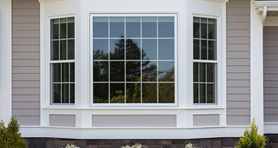 the exterior view of a tinted bay window