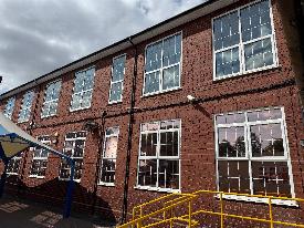 Pinfold street school, sunshield windwo film ltd install bronze solar control window film