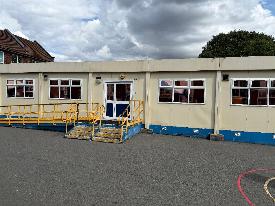 sunshield window film ltd installing solar control bronze to pinfold street school external  huts  in west bromwich